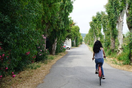 Girl Riding Bicycle