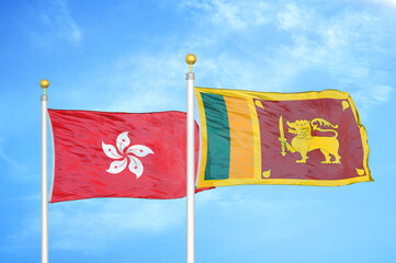 Hong Kong and Sri Lanka two flags on flagpoles and blue cloudy sky