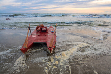 Viareggio, Italy - August 13, 2019: Catamaran on the beach of Viareggio, is a famous resort of...