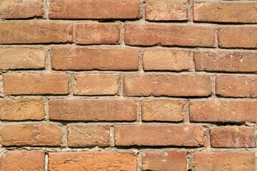Old wall of sturdy red brick horizontal close up