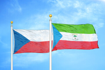 Naklejka na ściany i meble Czech and Equatorial Guinea two flags on flagpoles and blue cloudy sky