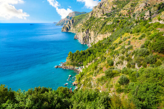 A view from the famous Amalfi Coast drive road towards the cliffs, mountains, coastline, beaches and Mediterranean Sea near the town of Sorrento, Italy