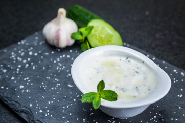 Delicious Lebanese food, Tzatziki sauce, produced with garlic, cucumber, mint and labneh.