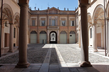Fototapeta na wymiar colonnade access to the hall of Palazzo Anguizzola di Grazzano sec. 17th, Piacenza, Italy