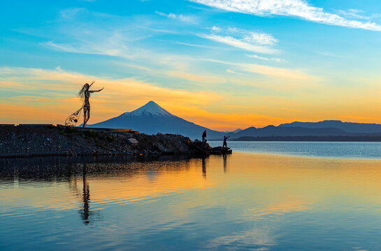 Sunrise along the Llanquihue lake with the Osorno volcano. View from Puerto Varas near Puerto Montt, Chile.