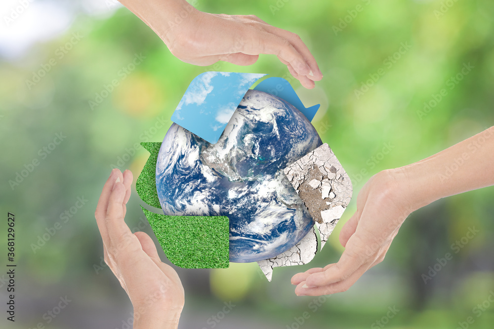 Canvas Prints recycle symbol and earth in hands over green nature background. environment concept. elements of thi