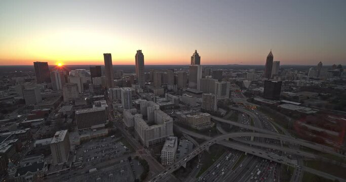 Atlanta Georgia Aerial v598 Flying over freeway during sunset with panning view of downtown and midtown - DJI Inspire 2, X7, 6k - February 2020