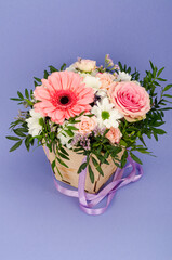 Flowers, bouquet in stylish wooden box. Studio Photo