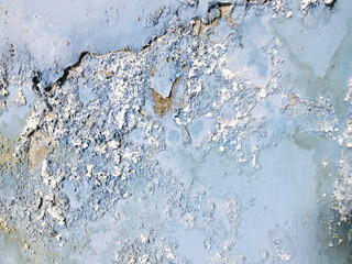 Rain water leaks on the ceiling causing damage, peeling paint and moldy.