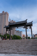 Naklejka premium China, Heihe, July 2019: Chinese-style Gate on the Heihe city waterfront in summer