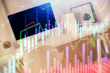 Double exposure of financial graph drawing and office interior background. Concept of stock market.