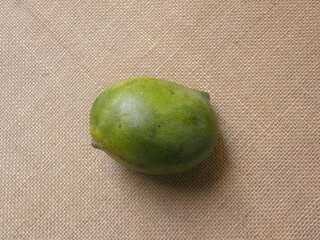 Green color raw whole ripe Kalaphad mango