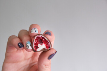 fresh red and shiny fresh raspberries dipped in homemade black and white chocolate