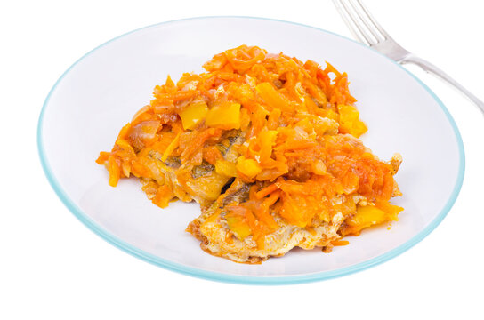 White fish fillet with stewed vegetables. Photo