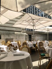 empty restaurant in the city, tables, umbrellas, Bryant Park, New York, cafe