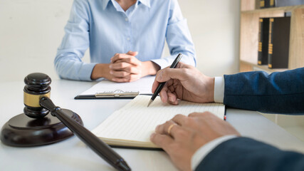 Lawsuit concept, Male lawyer consultant discussing with client in office.
