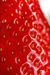 macro photo of the red texture surface of strawberries