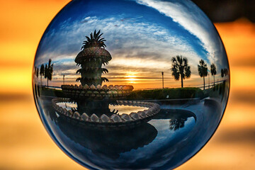 glass ball view pineapple fountain sunrise
