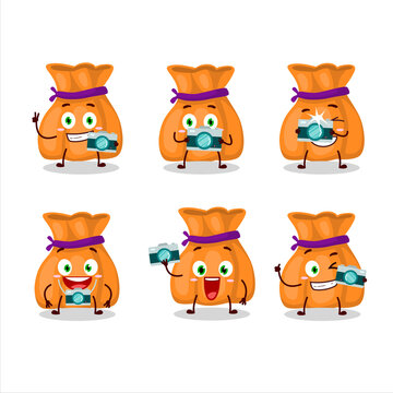 Photographer profession emoticon with orange candy sack cartoon character
