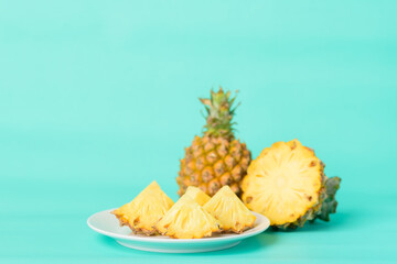 Fototapeta na wymiar Fresh pineapple fruit on pastel green background, Tropical fruit