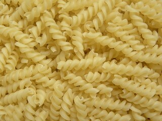 Yellow color raw dry Spiral pasta