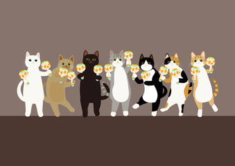 猫が音楽に合わせてマラカスを振ってダンスする