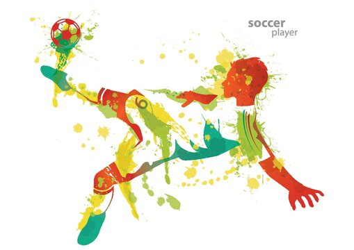 soccer player kicks a ball