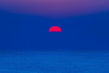 Colorful sun rise at sea