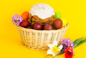 Delicious Easter cake, colored eggs for Easter celebration.