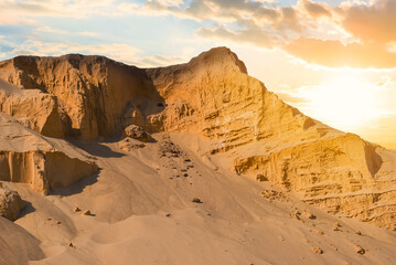 Fototapeta na wymiar huge sandy dune at the sunset