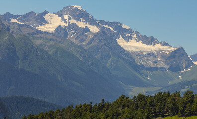 Fototapeta premium mountain ridge in a snow and ice, outdoor mountain travel scene