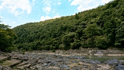 A ferryboat arrives at the shore of Arashiyama and Katsura River in Kyoto Prefecture on May 30,...