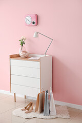 Modern chest of drawers in room
