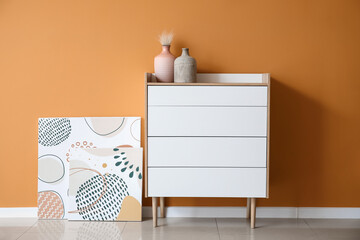 Interior of beautiful stylish room with chest of drawers