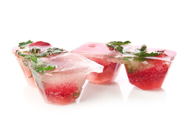 Ice with frozen berries on white background