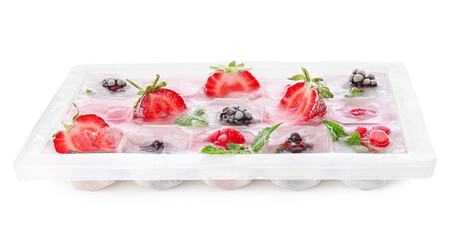 Tray with berries in ice on white background