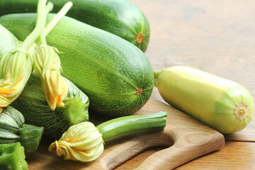 Fresh organic zucchini on the wooden table
