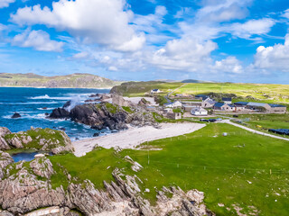 Aerial view of the beautiful coast next to Carrickabraghy Castle - Isle of Doagh, Inishowen, County Donegal - Ireland