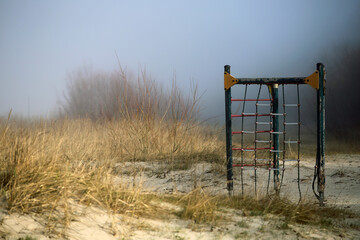 Fototapeta na wymiar ladder on the beach