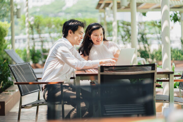 Photos of Asian couple, husband, looking for information on looking after their first child and relaxing by the pool.