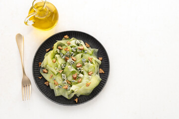 space cucumber slice salad with blue cheese food background