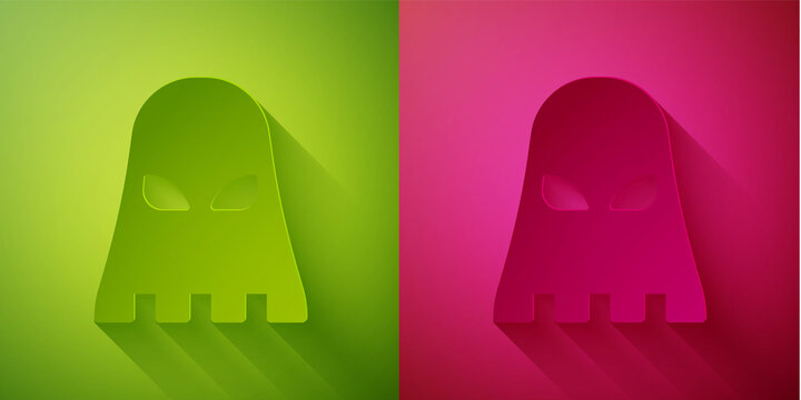 Paper cut Executioner mask icon isolated on green and pink background. Hangman, torturer, executor, tormentor, butcher, headsman icon. Paper art style. Vector.