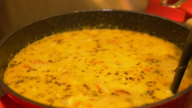 Tasty savoury fish soup atlantic prawns chowder closeup