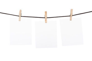 paper cards hanging rope isolated on white background
