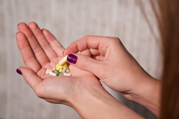 Pillen in der Hand