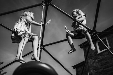 Children on a climbing frame in summer 
