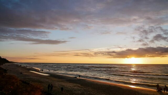 Beach Sunset Timelapse. Sunset Over Sea an Sandy Beach. Baltic Sea, Poland.