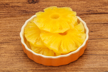 Marinated pineapple rings in the bowl
