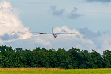 Glider coming in to land on the grass strip