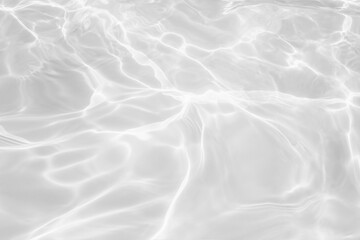 Closeup of desaturated transparent clear calm water surface texture with splashes and bubbles. Trendy abstract nature background. 